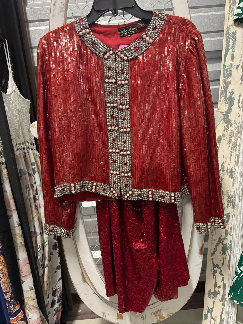 Woman Vintage-Inspired Red Sequin and pearl Beaded Jacket and Short set.